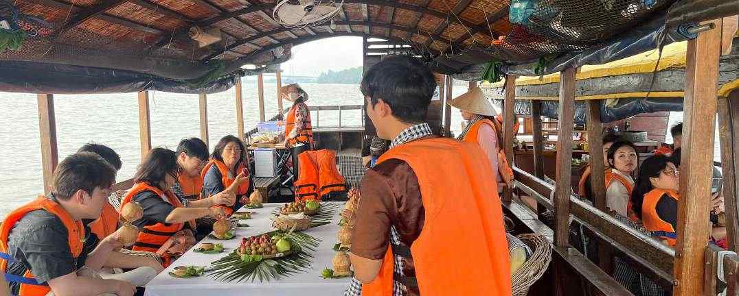 A shared meal on a river boat.